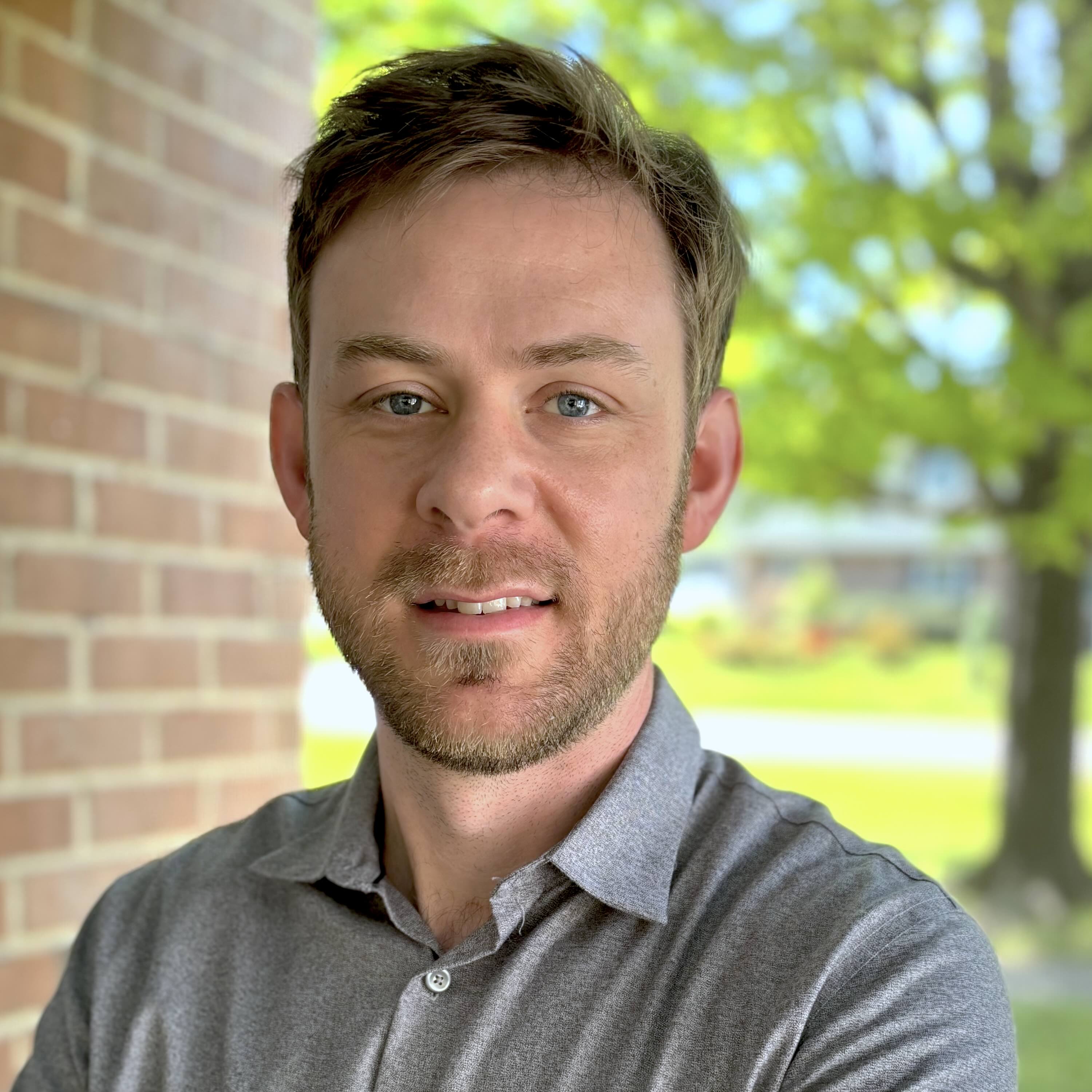 A head shot of Alex Keena, a political science professor at VCU